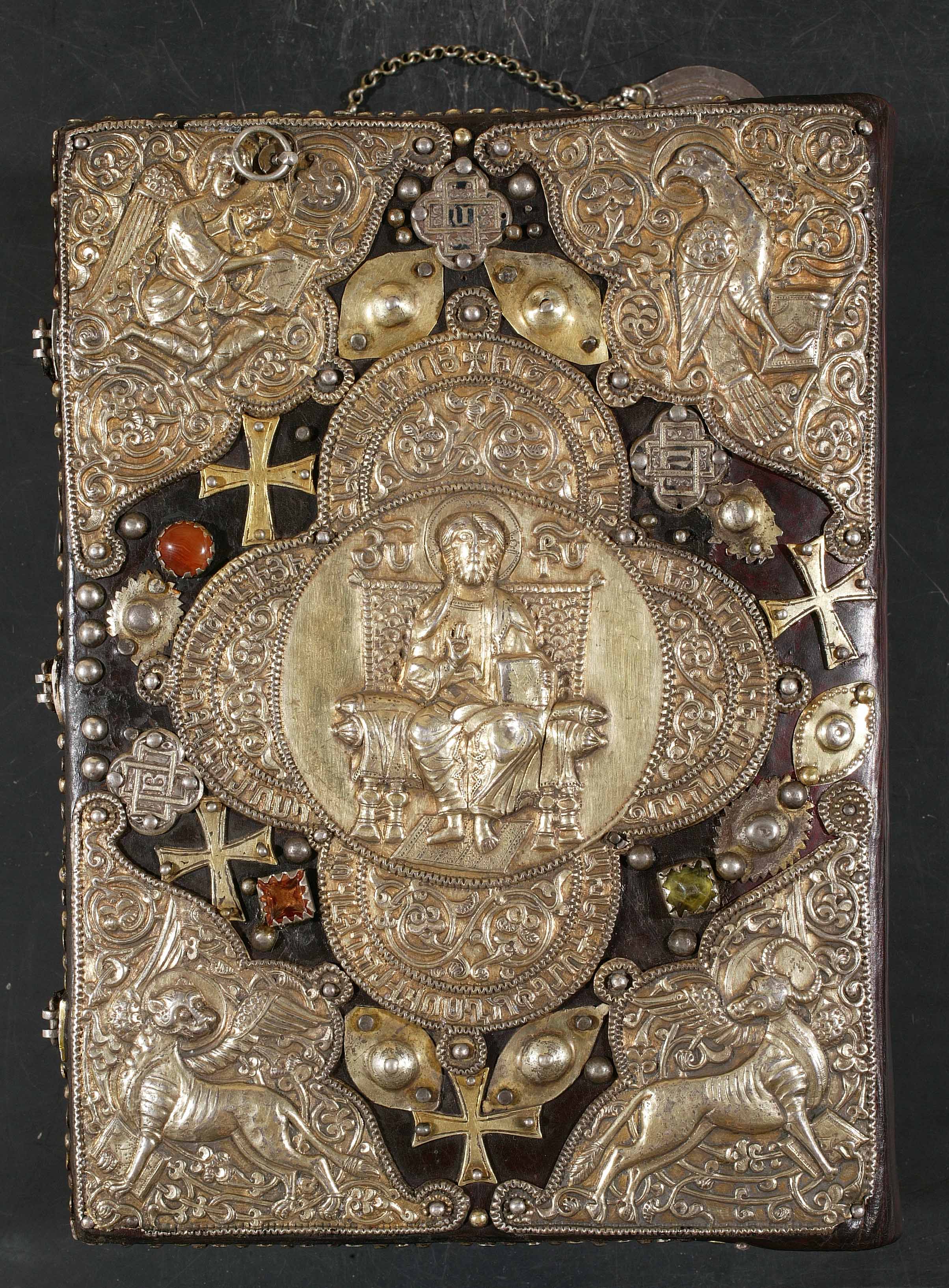Silver and jeweled covers on a manuscript from the Armenian church of Katʻoghikosutʻiwn Hayotsʻ Metsi Tann Kilikioy, Anṭilyās (<a href='https://w3id.org/vhmml/readingRoom/view/510608'>ACC 8</a>)